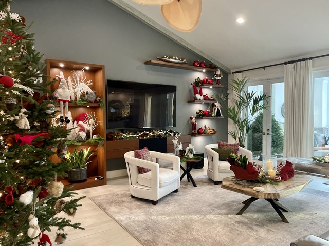 The same room from the tree side, with red accents through the shelves