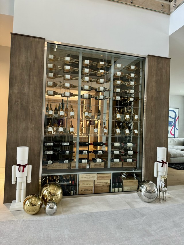 The wine wall from the side, with nutcrackers standing guard